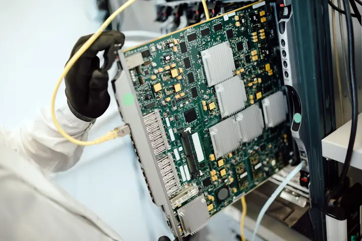 Image of IT administrators in front of a computer